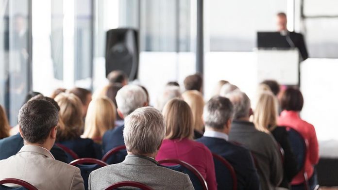 Business or professional conference. Presentation.