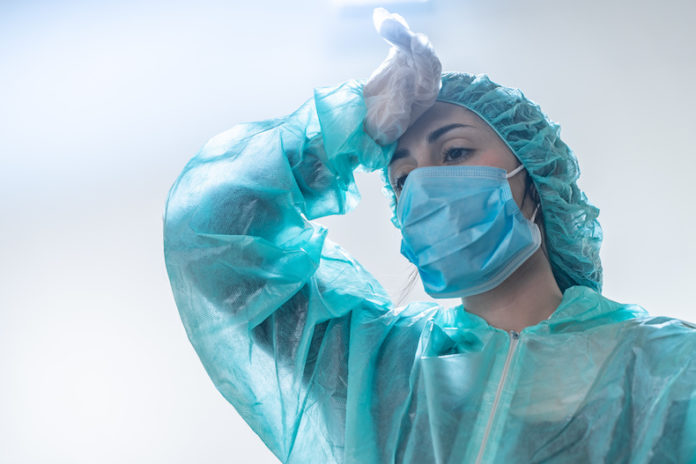 Coronavirus. Thank you doctors and nurses working in the hospitals and fighting the coronavirus. Doctors are heroes. Doctors in the protective suits and masks looking for a cure for the disease.